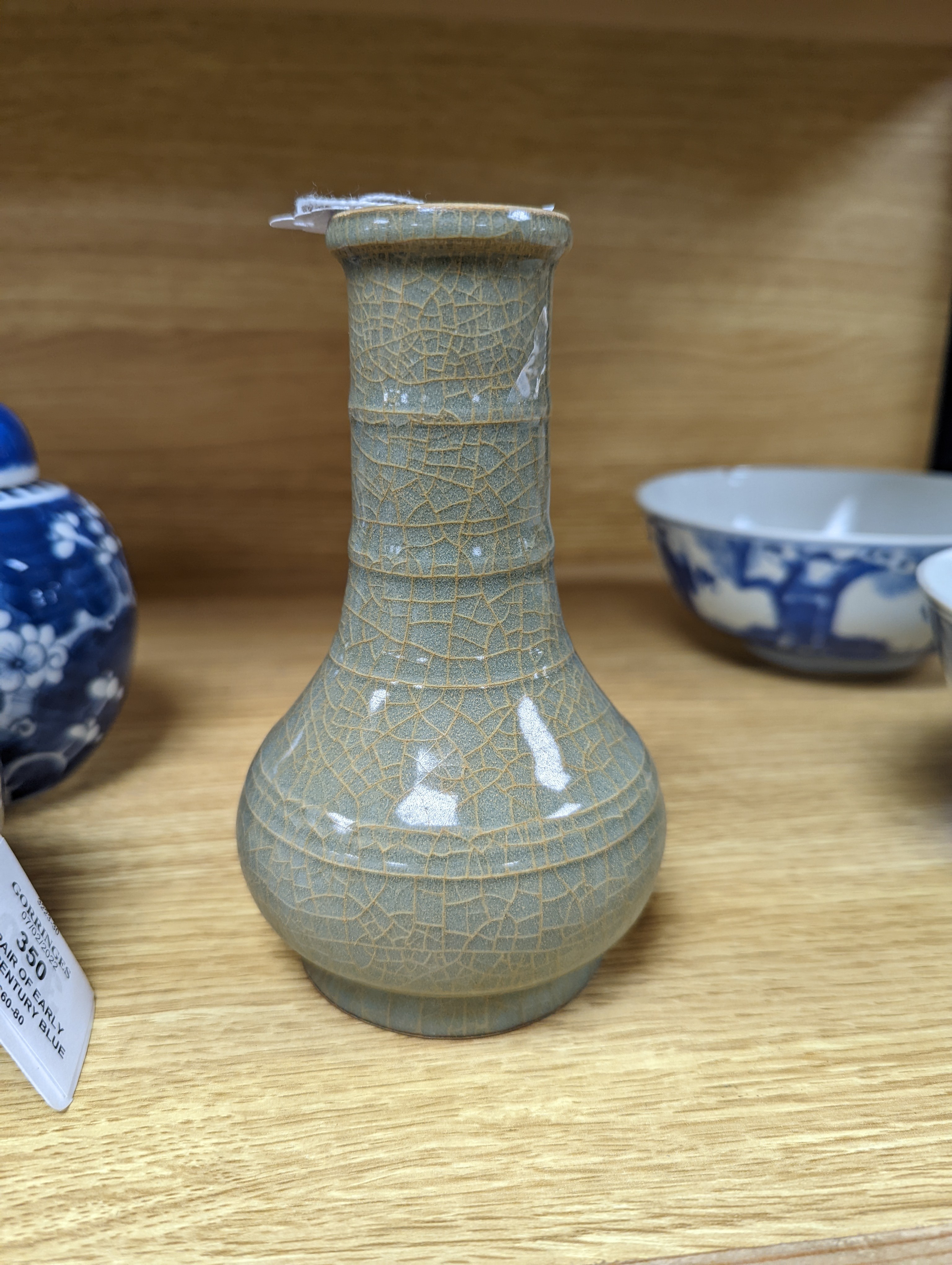 A Chinese celadon bottle vase 15.5cm
